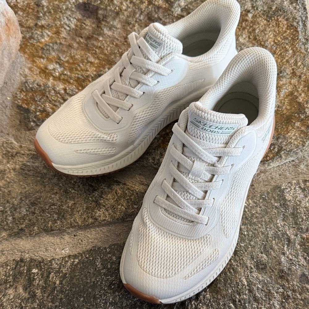 Skechers white slip on sneakers